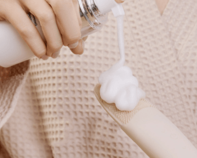 What is the proper way to do a facial cleansing?